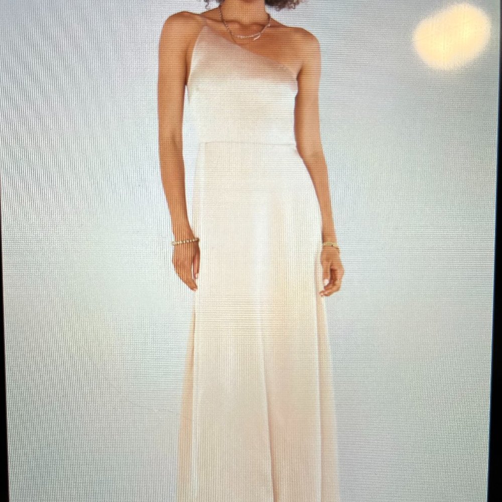 Champagne-colored full-length bridesmaid dress